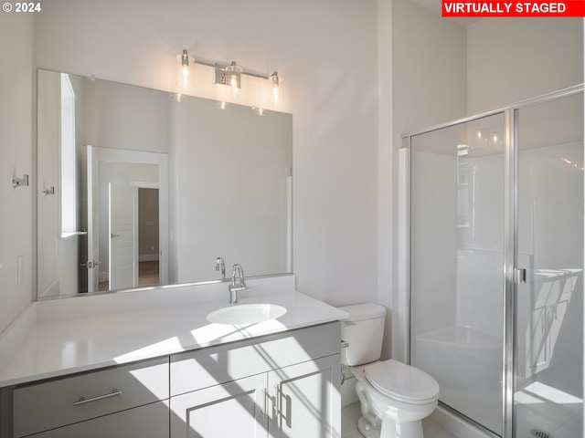 13906 SW 165th Ave, Tigard, OR 97223 - full bath featuring a stall shower, toilet, and vanity