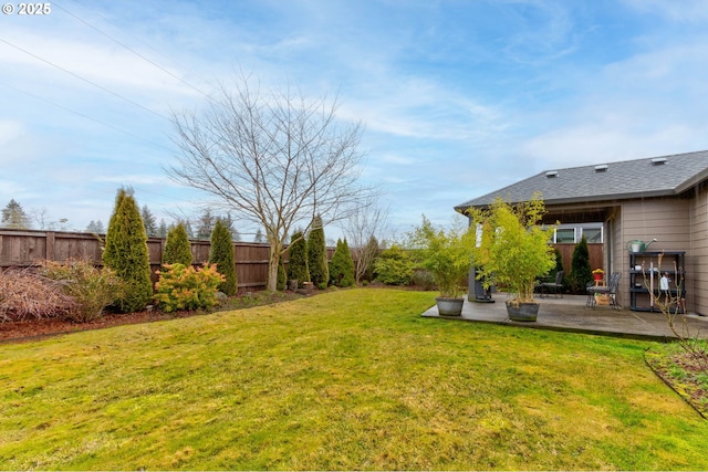 view of yard with a patio area