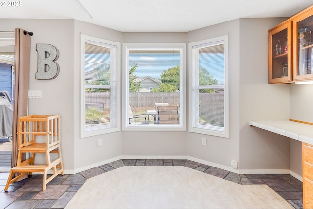 4870 Dorrance Loop NE, Salem, OR 97305 - unfurnished dining area with baseboards
