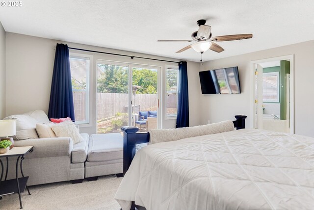 4870 Dorrance Loop NE, Salem, OR 97305 - bedroom featuring carpet flooring, ensuite bath, ceiling fan, and access to exterior