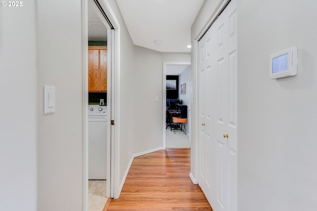 4870 Dorrance Loop NE, Salem, OR 97305 - corridor featuring washer / clothes dryer, light wood-type flooring, and an office area