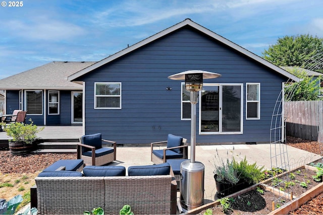 4870 Dorrance Loop NE, Salem, OR 97305 - back of house with an outdoor hangout area, a patio area, a deck, and a vegetable garden