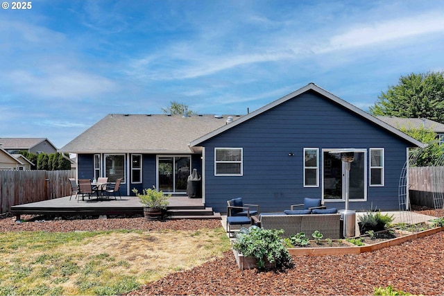 4870 Dorrance Loop NE, Salem, OR 97305 - rear view of house with a deck, a vegetable garden, and an outdoor living space