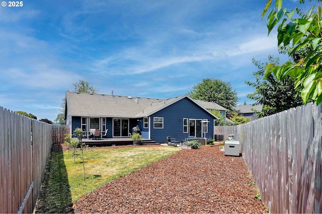 4870 Dorrance Loop NE, Salem, OR 97305 - back of house with a wooden deck and a fenced backyard
