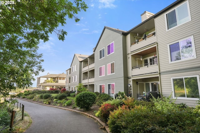 view of building exterior with a residential view
