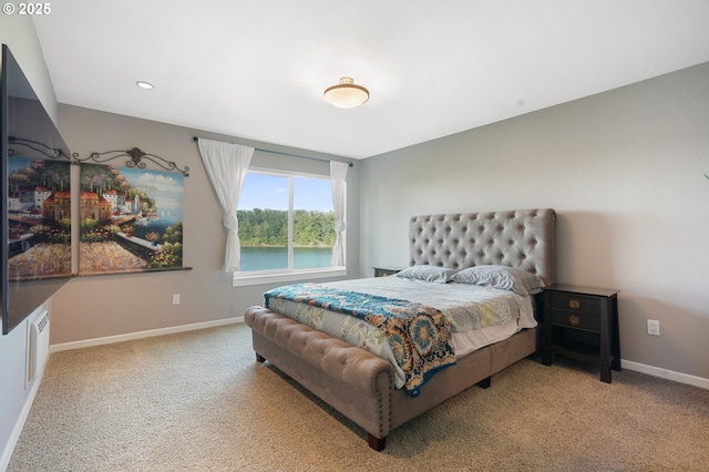 carpeted bedroom with baseboards and recessed lighting