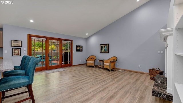 35130 Ponderosa Loop, Manzanita, OR 97130 - home office featuring french doors, light wood-type flooring, high vaulted ceiling, and recessed lighting