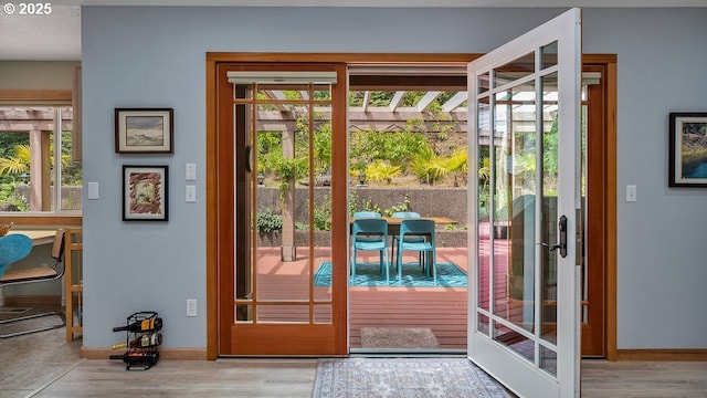 35130 Ponderosa Loop, Manzanita, OR 97130 - doorway featuring plenty of natural light and wood finished floors