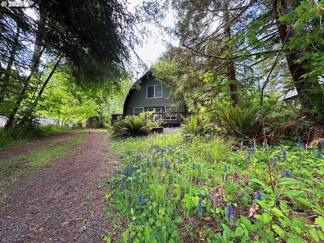 10056 Beach Dr, Birkenfeld, OR 97016 - view of side of property with a deck