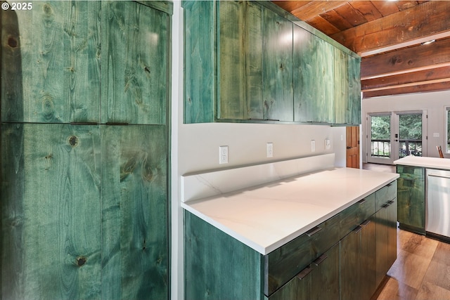 10056 Beach Dr, Birkenfeld, OR 97016 - kitchen with light wood-style floors, wooden ceiling with exposed beams, stainless steel dishwasher, and light countertops