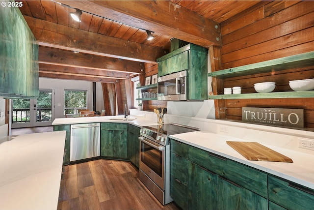 10056 Beach Dr, Birkenfeld, OR 97016 - kitchen featuring green cabinetry, appliances with stainless steel finishes, open shelves, a sink, and wooden ceiling with exposed beams