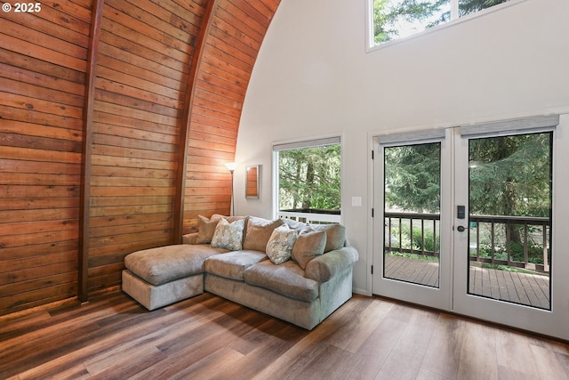 10056 Beach Dr, Birkenfeld, OR 97016 - living room with french doors, wood finished floors, and high vaulted ceiling