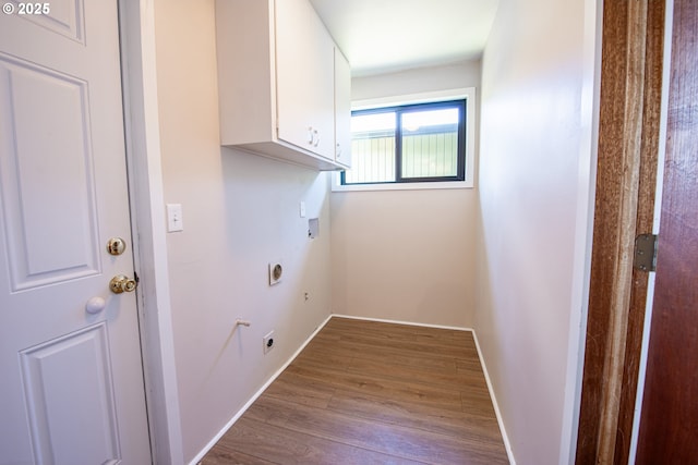 288 51st St, Springfield, OR 97478 - washroom with hookup for an electric dryer, baseboards, hookup for a washing machine, wood finished floors, and cabinet space