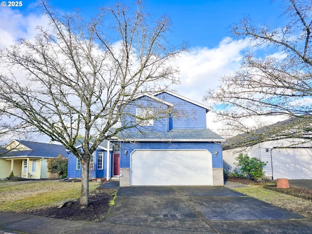 front facade featuring a front yard and a garage