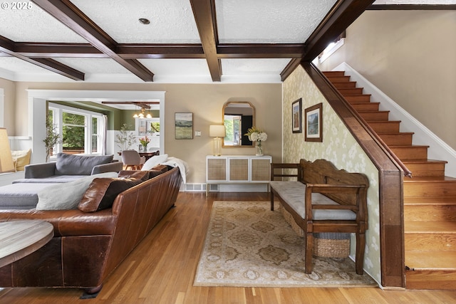 2006 SE 41st Ave, Portland, OR 97214 - living room with coffered ceiling, stairs, wood finished floors, beam ceiling, and baseboards