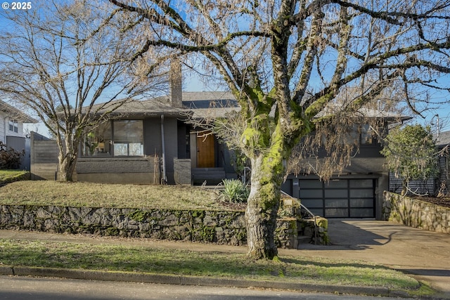 view of front of property with a garage