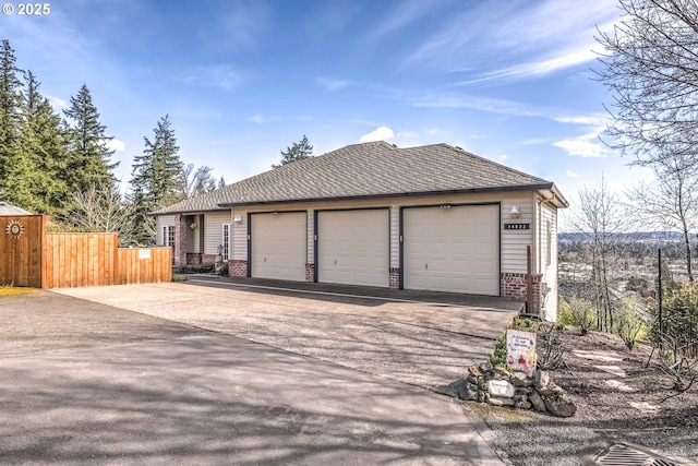 garage with fence