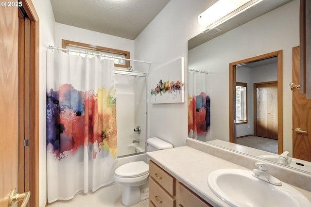 bathroom featuring vanity, toilet, visible vents, and shower / bath combo with shower curtain