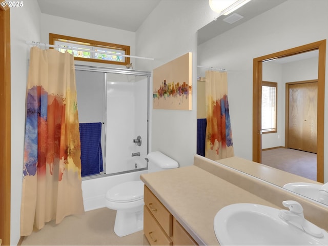 full bath with vanity, toilet, and shower / tub combo with curtain