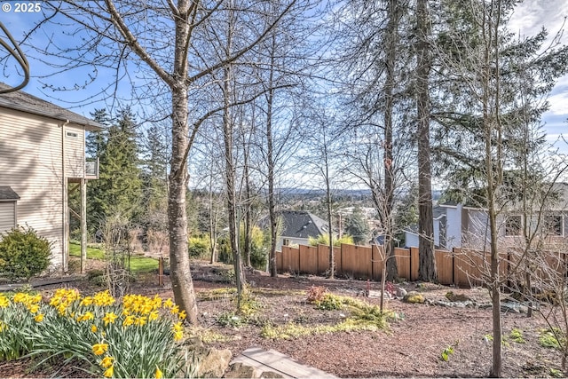 view of yard featuring fence