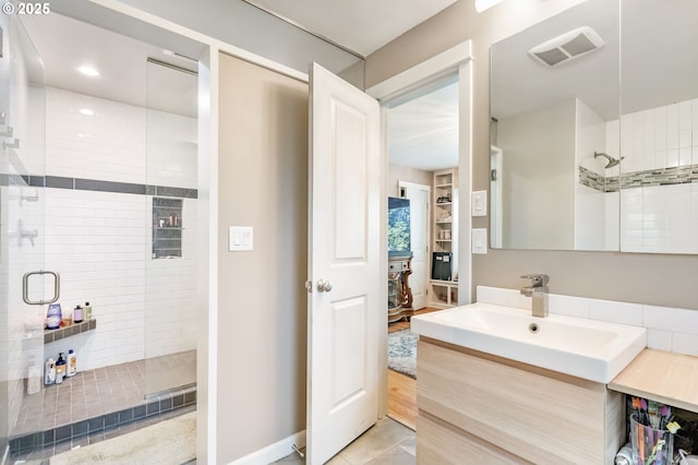 5200 SW Scholls Ferry Rd, Portland, OR 97225 - bathroom featuring tile patterned flooring, vanity, baseboards, a shower stall, and visible vents