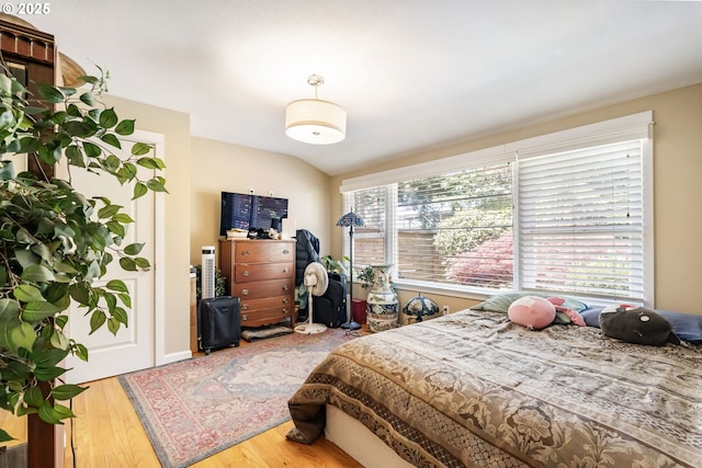 5200 SW Scholls Ferry Rd, Portland, OR 97225 - bedroom featuring wood finished floors and lofted ceiling