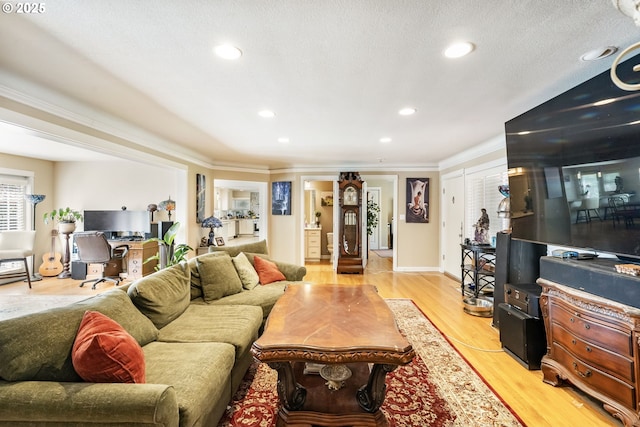 5200 SW Scholls Ferry Rd, Portland, OR 97225 - living area with light wood-type flooring, recessed lighting, and crown molding