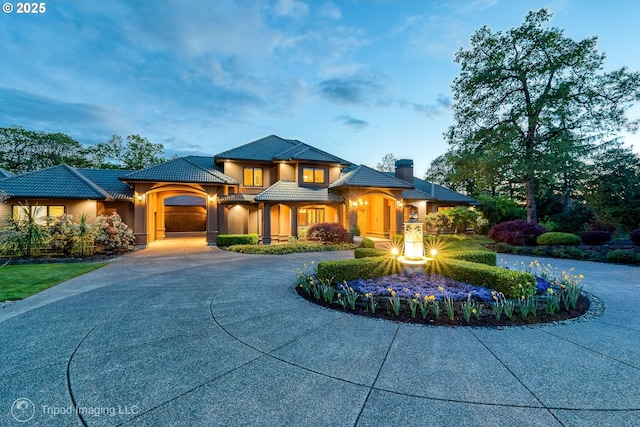 view of front of property with a garage