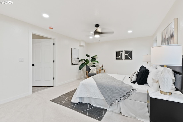 carpeted bedroom featuring recessed lighting, a ceiling fan, and baseboards