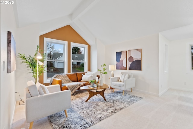 carpeted living room featuring baseboards and vaulted ceiling