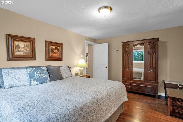 1588 20th St, Florence, OR 97439 - bedroom featuring dark wood finished floors
