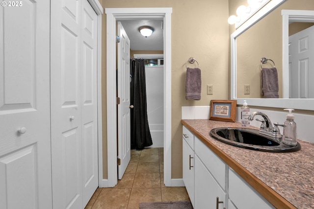 1588 20th St, Florence, OR 97439 - full bathroom with vanity, a closet, tile patterned floors, and shower / tub combo