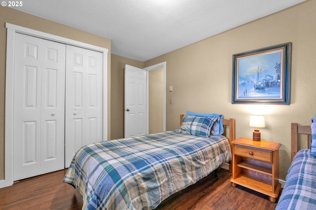 1588 20th St, Florence, OR 97439 - bedroom with wood finished floors and a closet