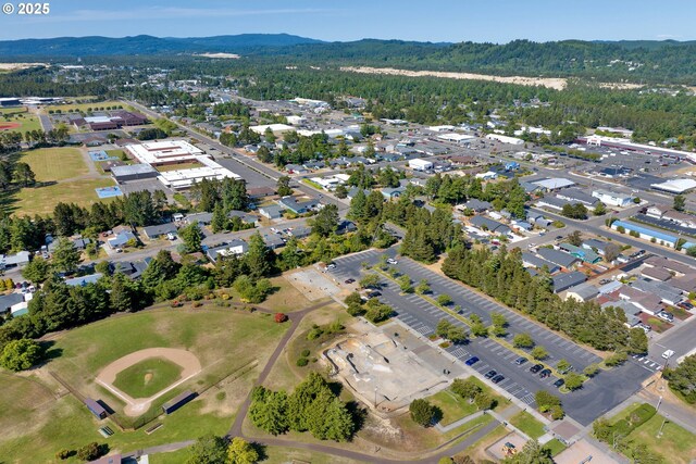 1588 20th St, Florence, OR 97439 - aerial overview of property's location with nearby suburban area