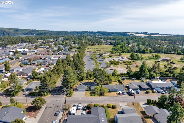 1588 20th St, Florence, OR 97439 - aerial view of property and surrounding area featuring nearby suburban area