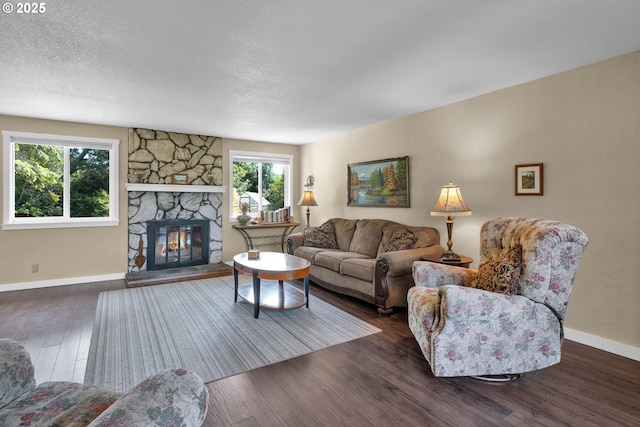 1588 20th St, Florence, OR 97439 - living room with wood finished floors and a fireplace