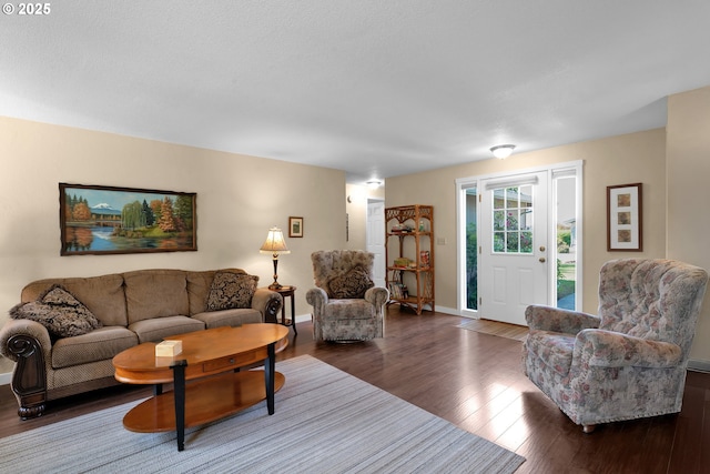 1588 20th St, Florence, OR 97439 - living area with wood finished floors and baseboards
