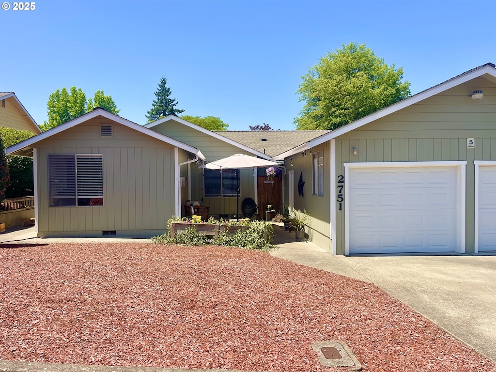 2751 W Lorraine Ave, Roseburg, OR 97471 - view of front of home featuring concrete driveway, an attached garage, and crawl space