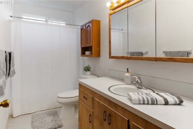 10525 SE Mitchell St, Portland, OR 97266 - bathroom featuring vanity, toilet, and curtained shower