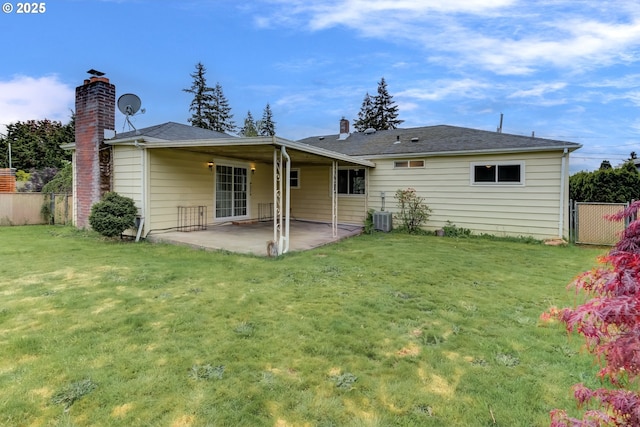 10525 SE Mitchell St, Portland, OR 97266 - back of property with a patio area, a chimney, and cooling unit