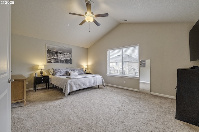 bedroom with visible vents, lofted ceiling, carpet floors, baseboards, and ceiling fan