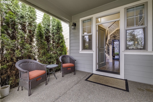 property entrance with a patio