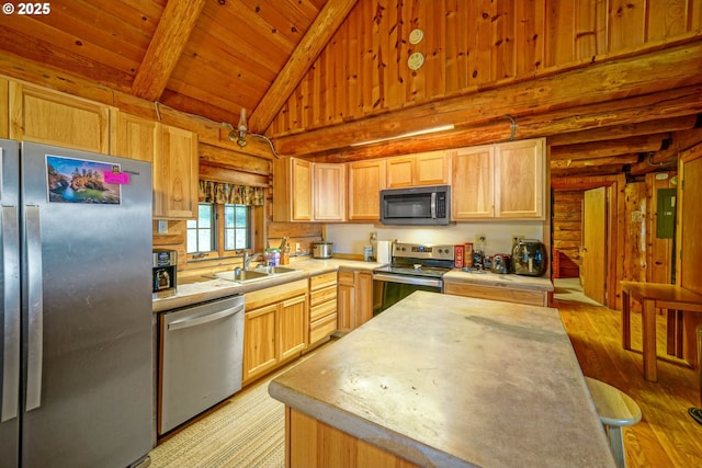 31975 Berlin Rd, Lebanon, OR 97355 - kitchen with a sink, light countertops, appliances with stainless steel finishes, wooden ceiling, and beamed ceiling