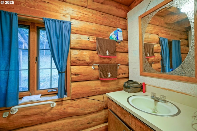 31975 Berlin Rd, Lebanon, OR 97355 - bathroom featuring log walls and vanity