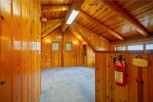 31975 Berlin Rd, Lebanon, OR 97355 - bonus room featuring lofted ceiling with beams, wood ceiling, wood walls, and carpet floors