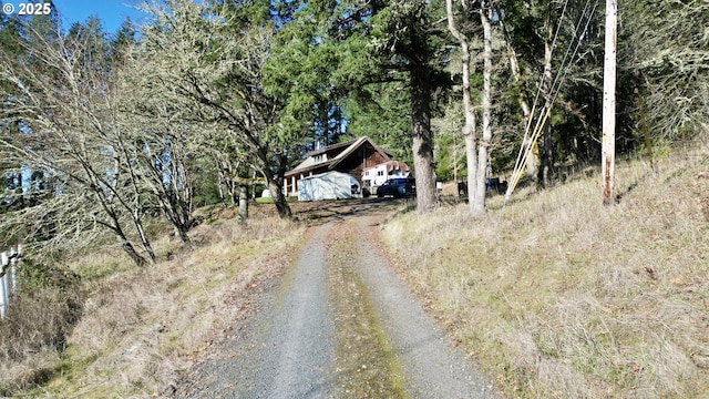 31975 Berlin Rd, Lebanon, OR 97355 - view of street with a forest view and driveway