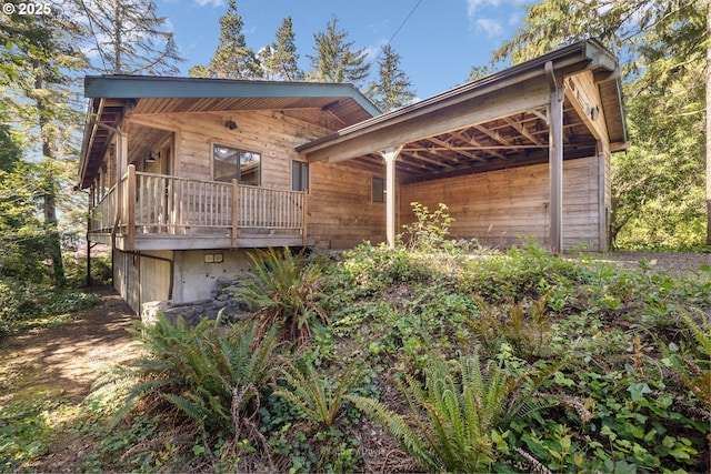 view of front of property with a balcony and an attached garage