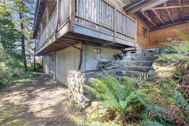 view of home's exterior featuring a deck