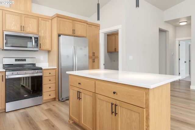 3237 Wildflower Dr, Springfield, OR 97478 - kitchen with appliances with stainless steel finishes, light brown cabinets, light wood-style floors, light countertops, and lofted ceiling