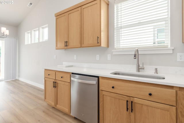 3237 Wildflower Dr, Springfield, OR 97478 - kitchen with dishwasher, light wood finished floors, light countertops, light brown cabinets, and a chandelier